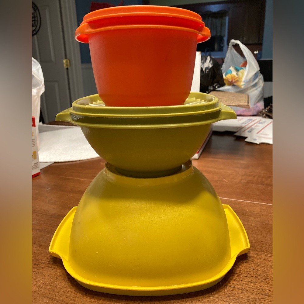Three vintage Tupperware bowls in original colors